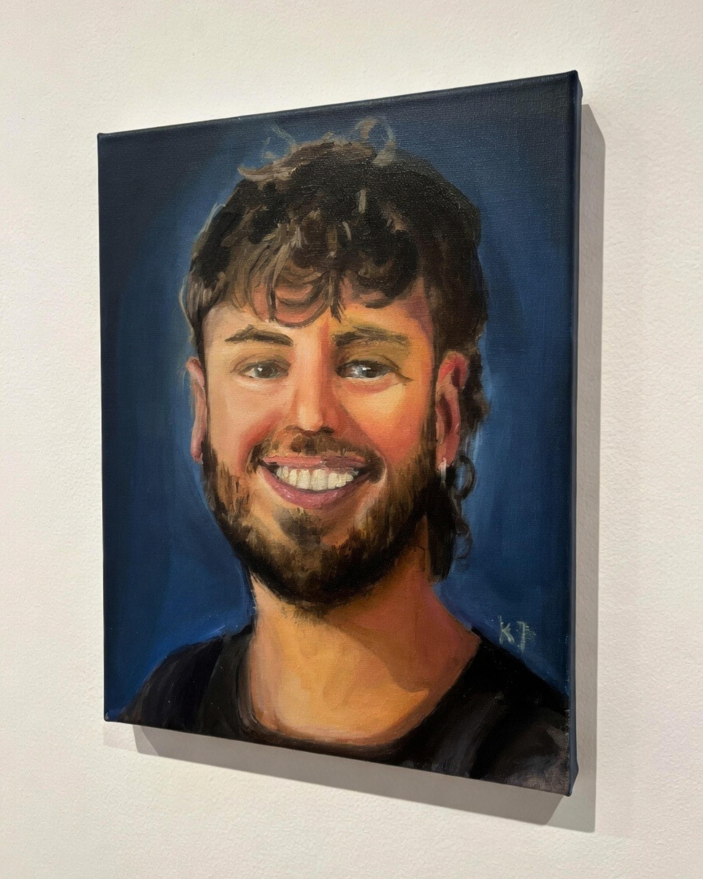 Commissioned portrait painting of a smiling man on canvas, hand-painted from a reference photo with rich color and soft lighting